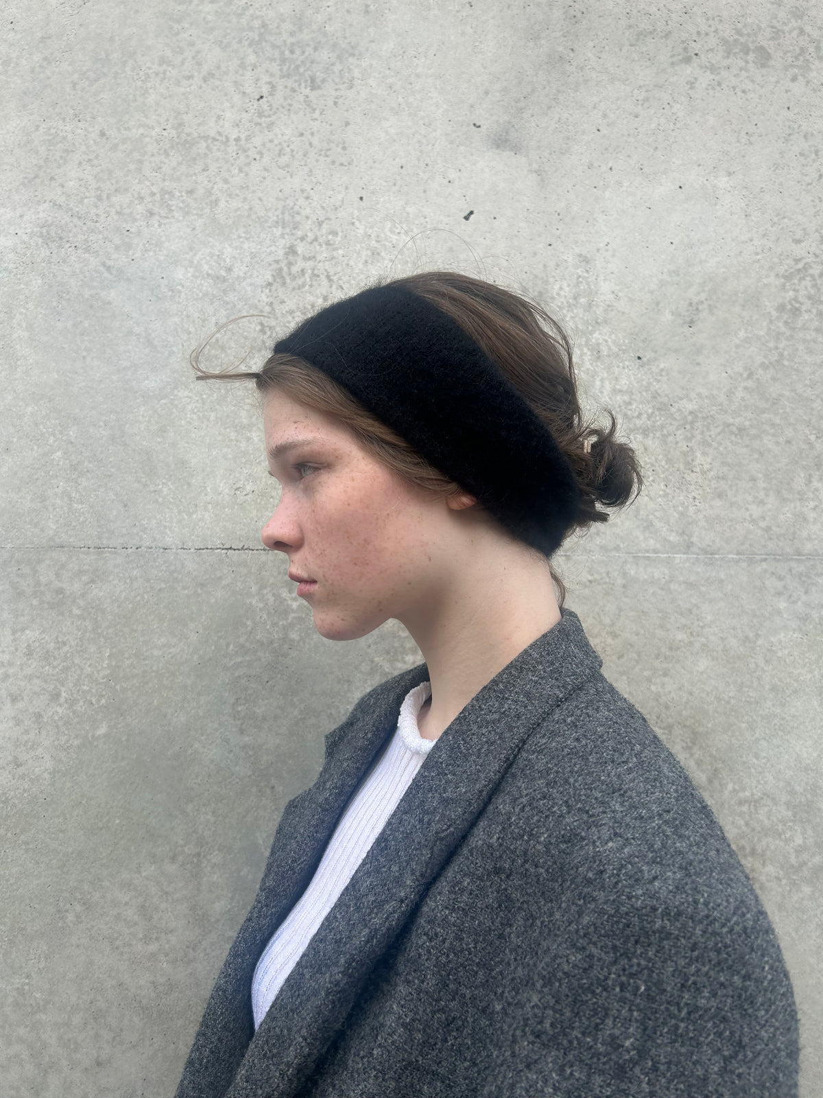 A soft and lightweight unisex headband knitted from alpaka wool .