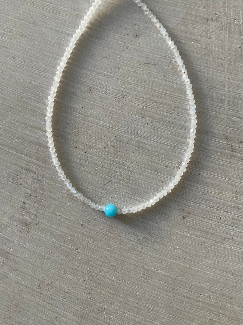 Faceted Glass Bead Necklace with Blue Centre Bead