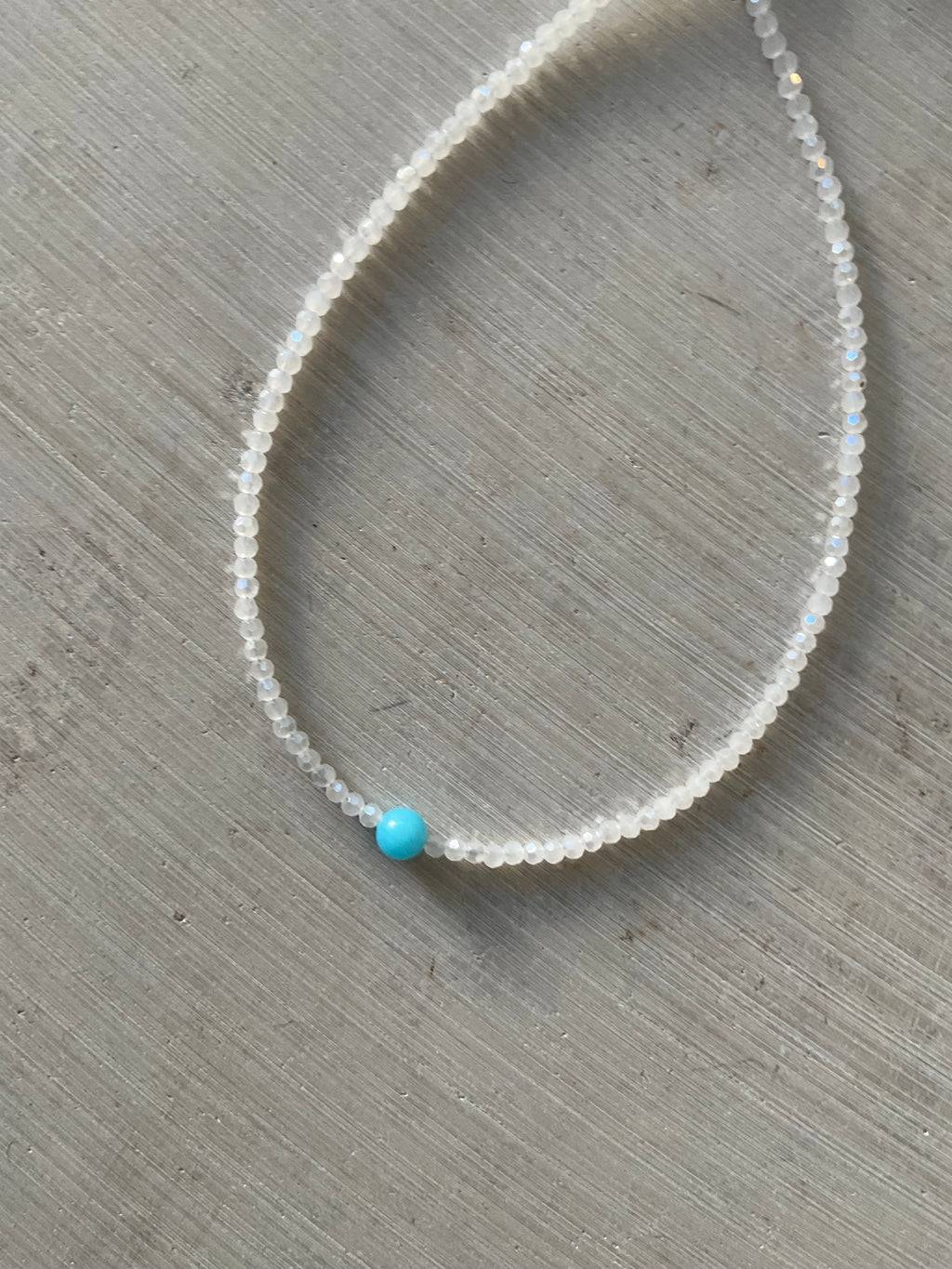 Faceted Glass Bead Necklace with Blue Centre Bead