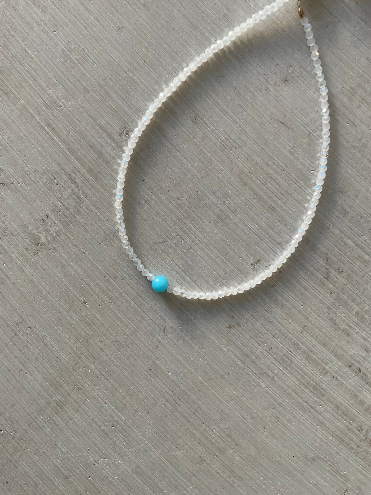Faceted Glass Bead Necklace with Blue Centre Bead