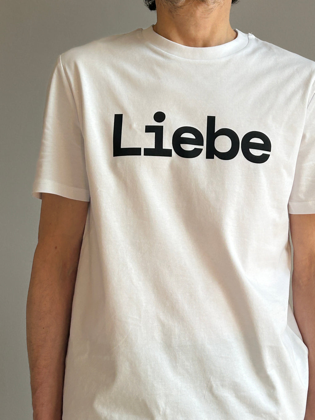 AEM  tshirt LIEBE white with black letters