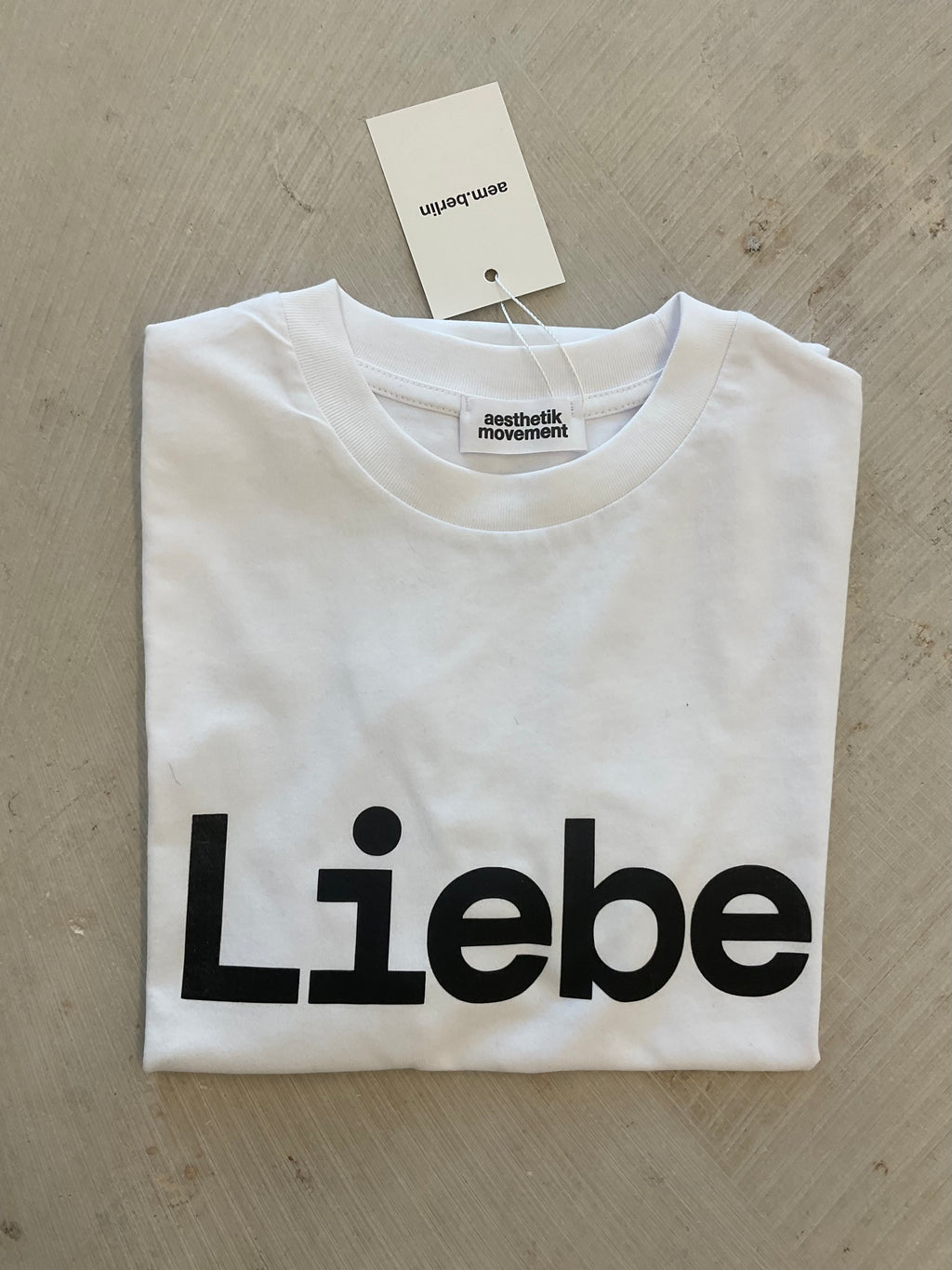 AEM  tshirt LIEBE white with black letters