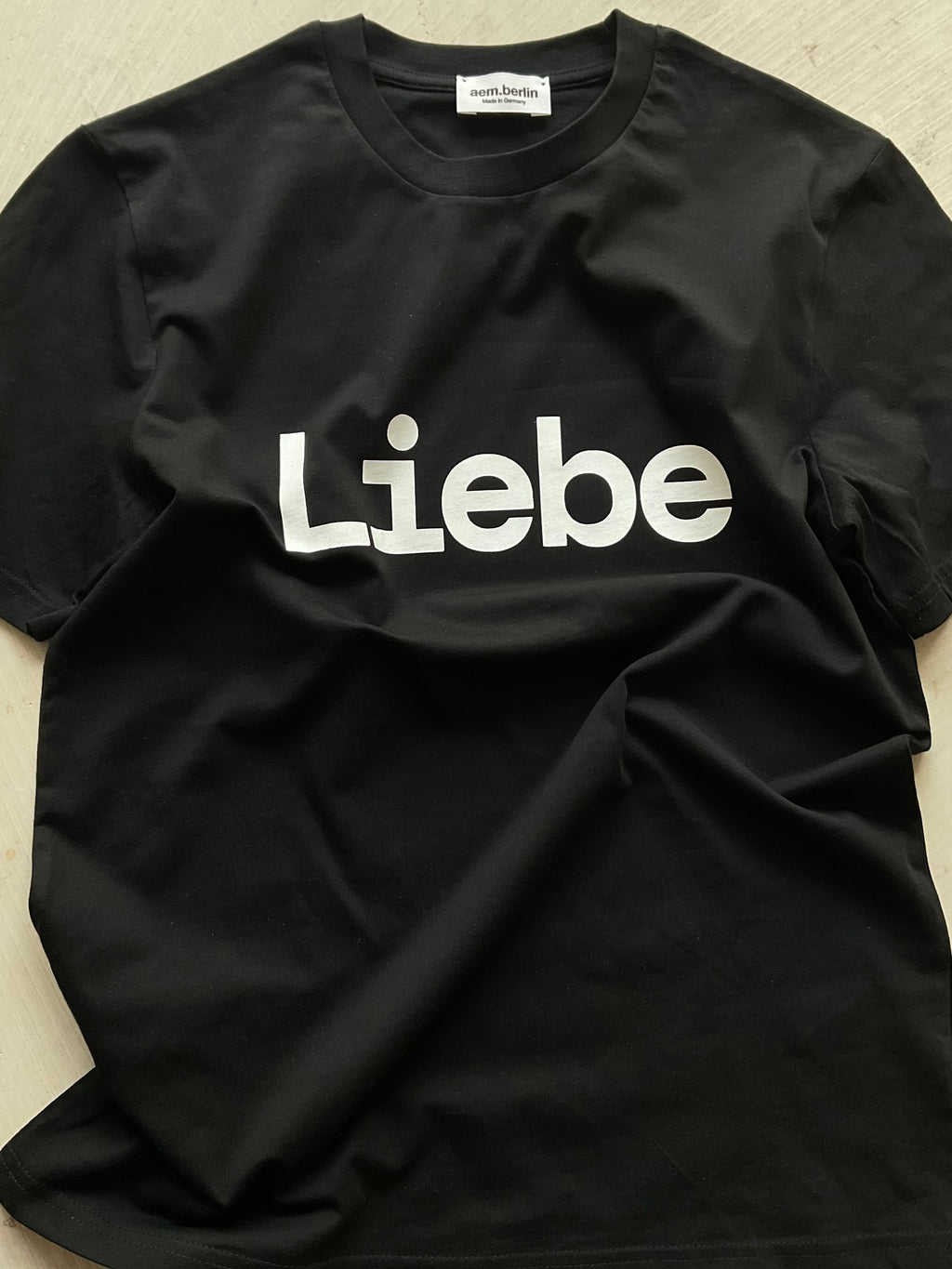 AEM  tshirt LIEBE black with white letters